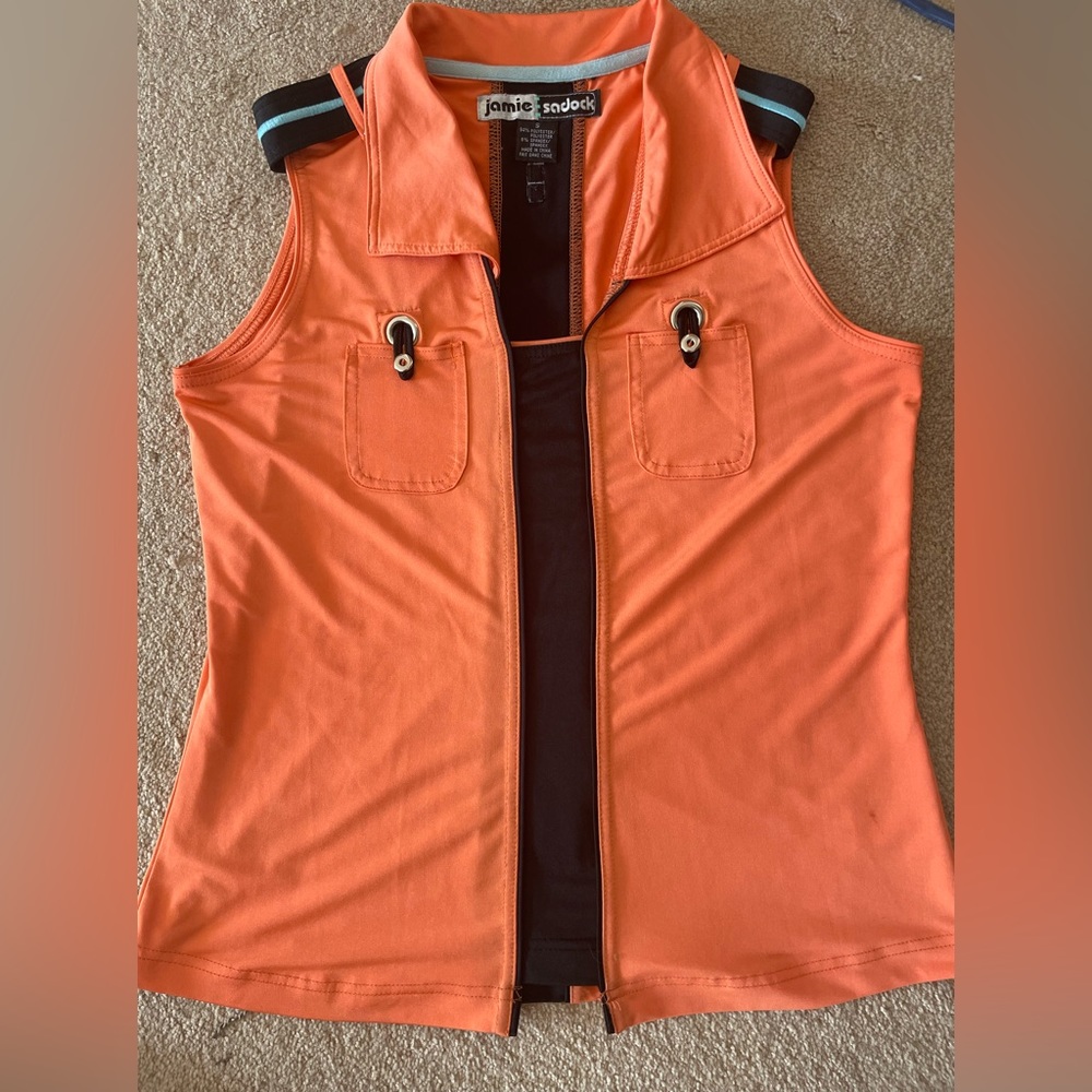 Orange and Black women’s size Small, Jamie Sadock.